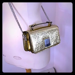 Gold croc-embossed mini-bag.